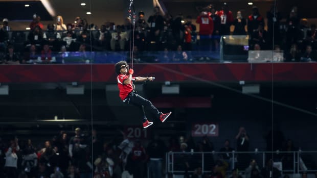 Rapper Ludacris performs during a game between the Atlanta Falcons and New Orleans Saints.